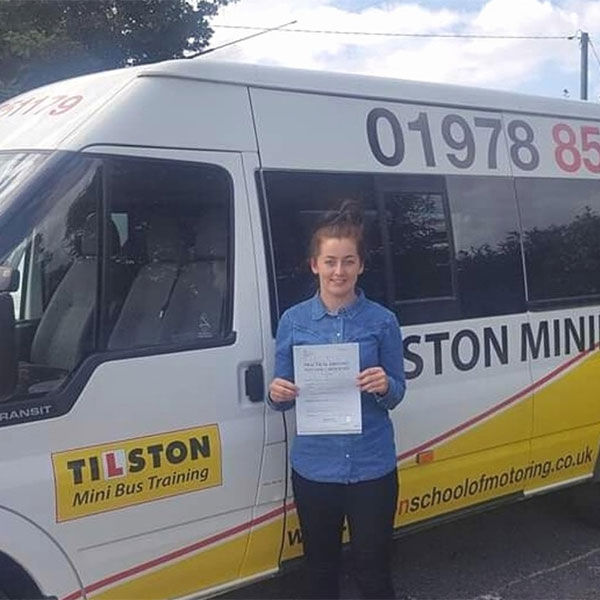 Woman passing minibus test in Wrexham