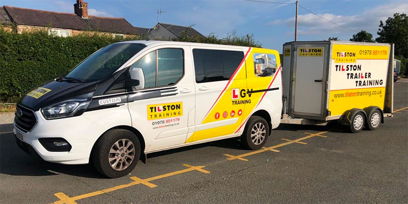 Trailer being towed by minibus at Tilston Training in Wrexham